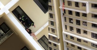 Clip: ‘Nghẹt thở’ giây phút giải cứu cô gái định nhảy từ tầng 18 chung cư
